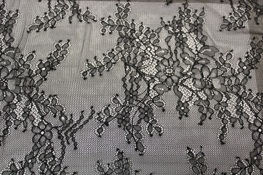 Tissu dentelle - motif fleuri - noir