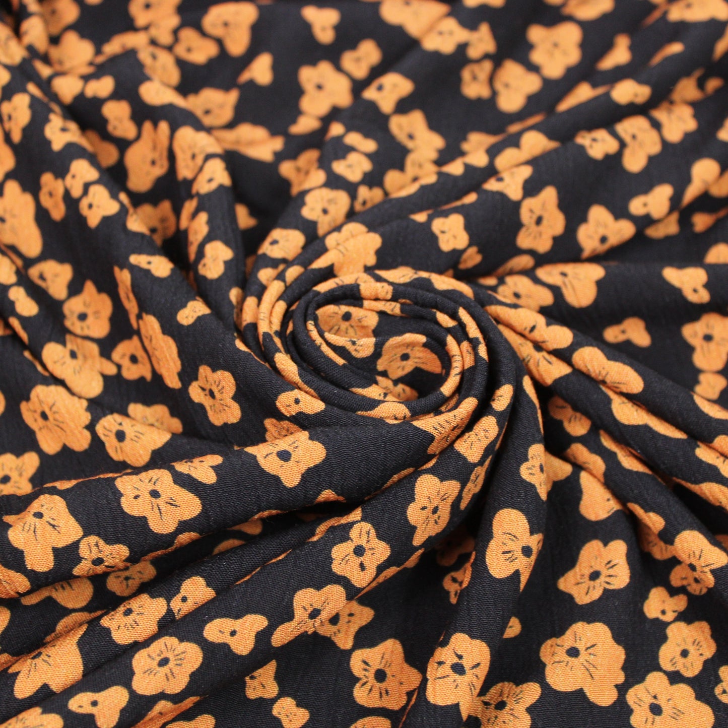 Tissu crêpe viscose - imprimé fleuri - ton orangé - photo 1/5 | So Tissus