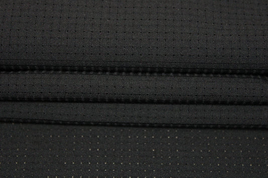 Tissu crêpe perforé - noir - photo 2/4 | So Tissus