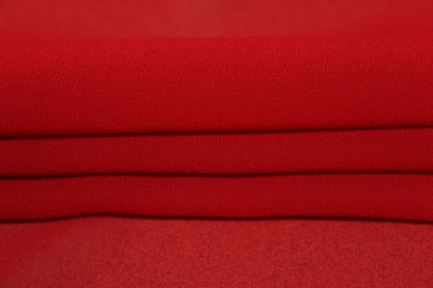 Tissu crêpe georgette de soie - rouge - photo 2/4 | So Tissus