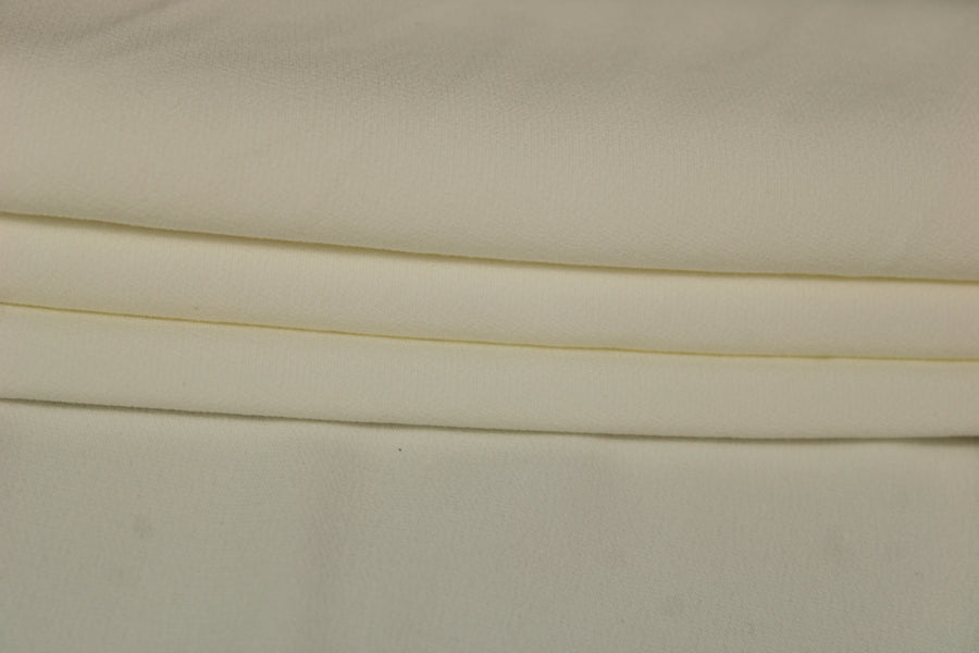 Tissu crêpe envers satin stretch - blanc cassé