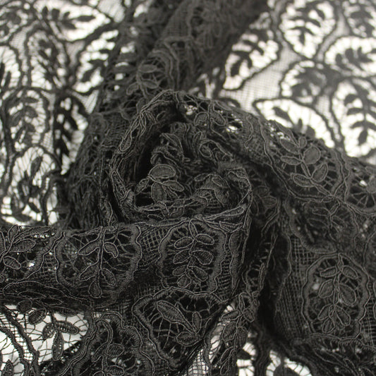 Tissu guipure - motif feuilles - noir - photo 1/4 | So Tissus