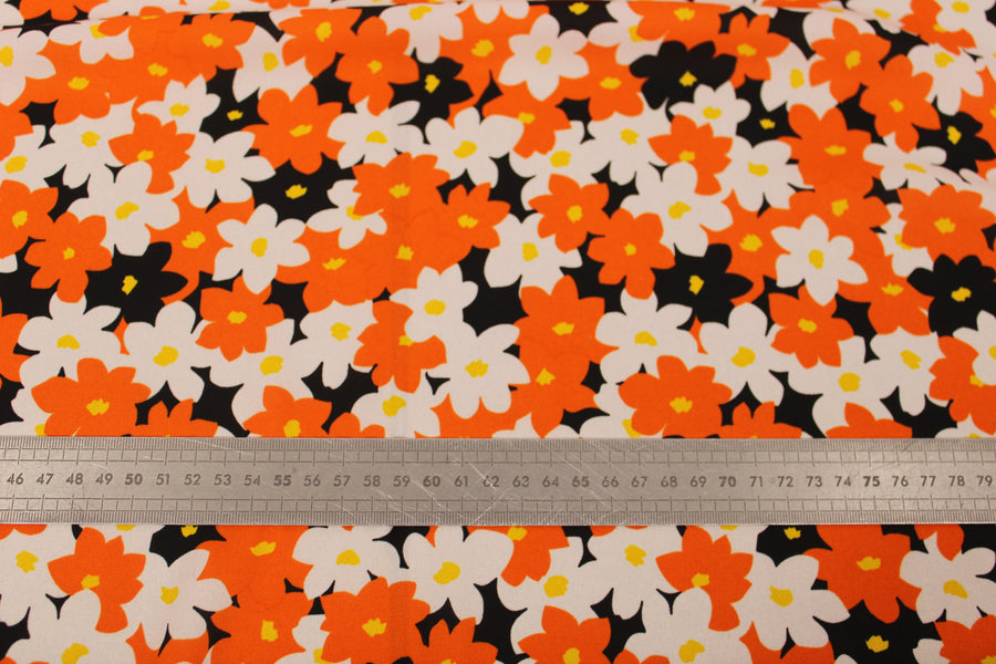 Tissu crêpe georgette  - imprimé fleurs vintages  - noir, orange et blanc