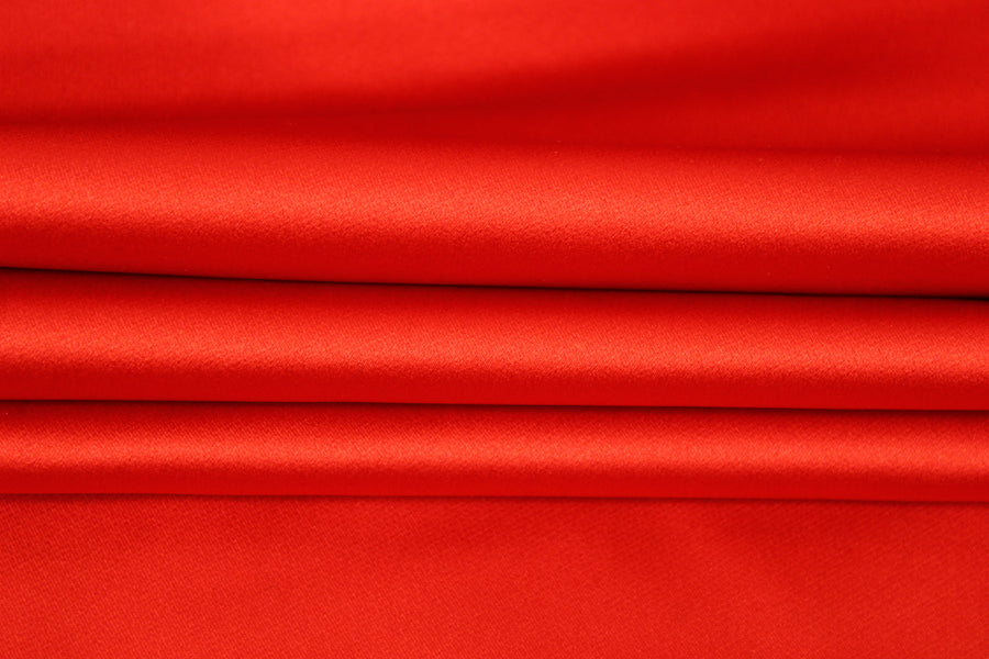 Tissu satin duchesse - orange rouge