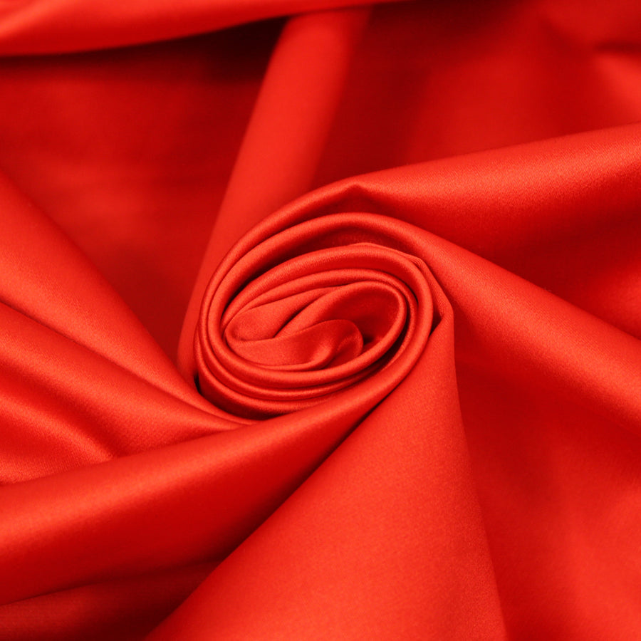 Tissu satin duchesse - orange rouge