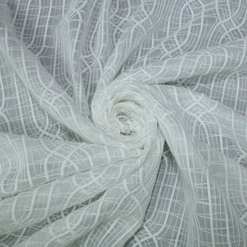 Tissu voile coton brodé - motif géométrique - blanc