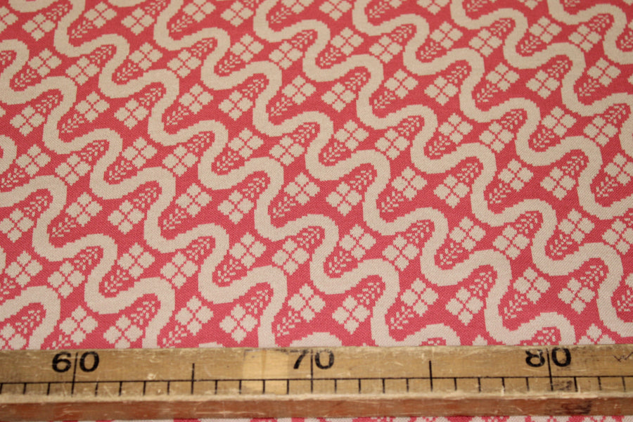Tissu maille - imprimé géométrique - rose et beige