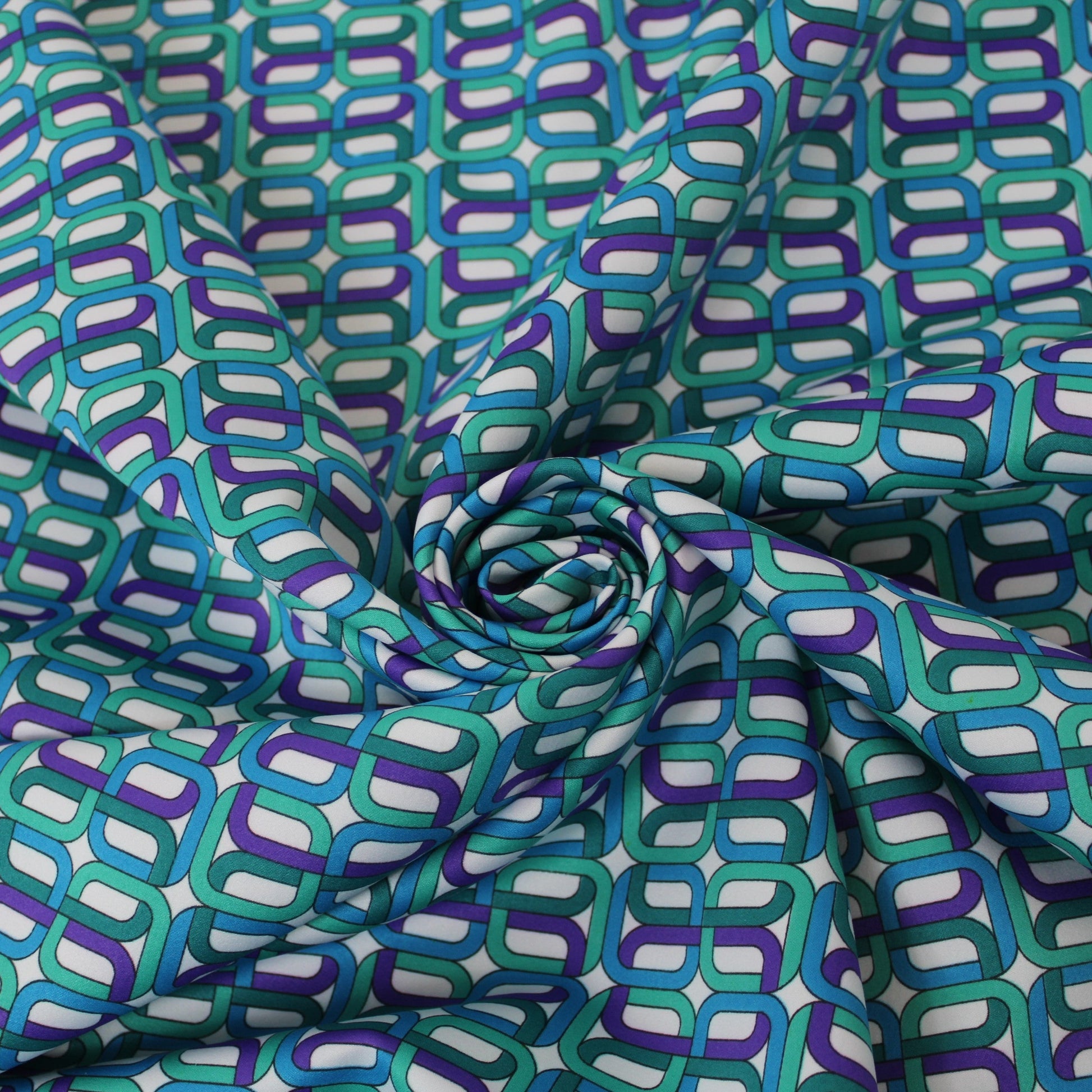 Tissu satin - imprimé géométrique - bleu vert et violet - photo 1/5 | So Tissus