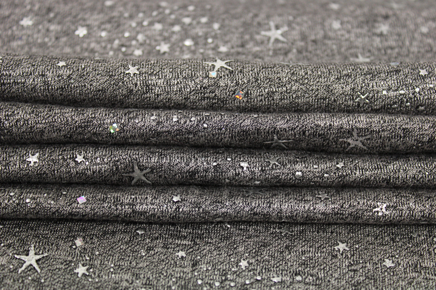 Tissu maille jersey floqué - gris anthracite - motif étoile - photo 2/5 | So Tissus