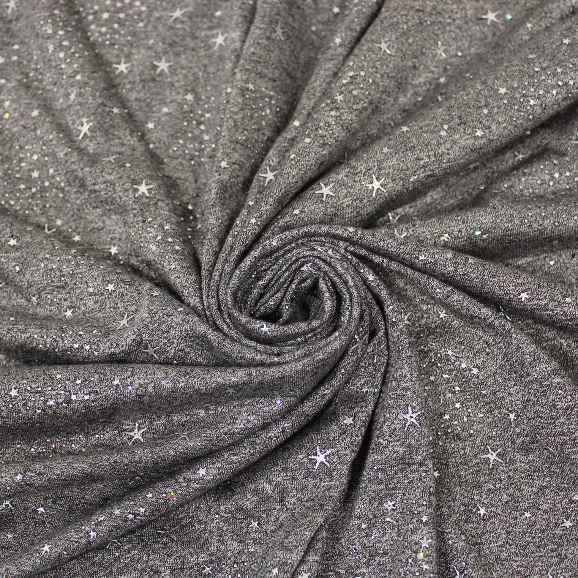 Tissu maille jersey floqué - gris anthracite - motif étoile - photo 1/5 | So Tissus