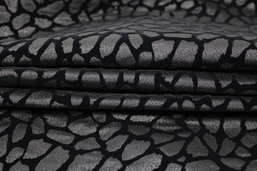 Tissu brocart motif tacheté - ton noir
