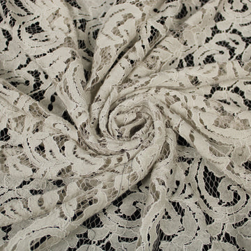 Tissu dentelle motif fleuri- beige et blanc