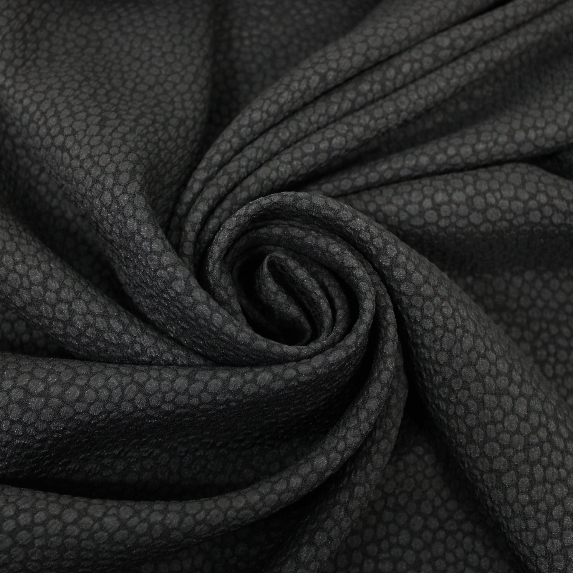 Tissu crêpe gaufré tacheté - noir - photo 1/4 | So Tissus