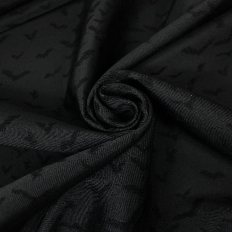 Tissu brocart motif chauve-souris - noir