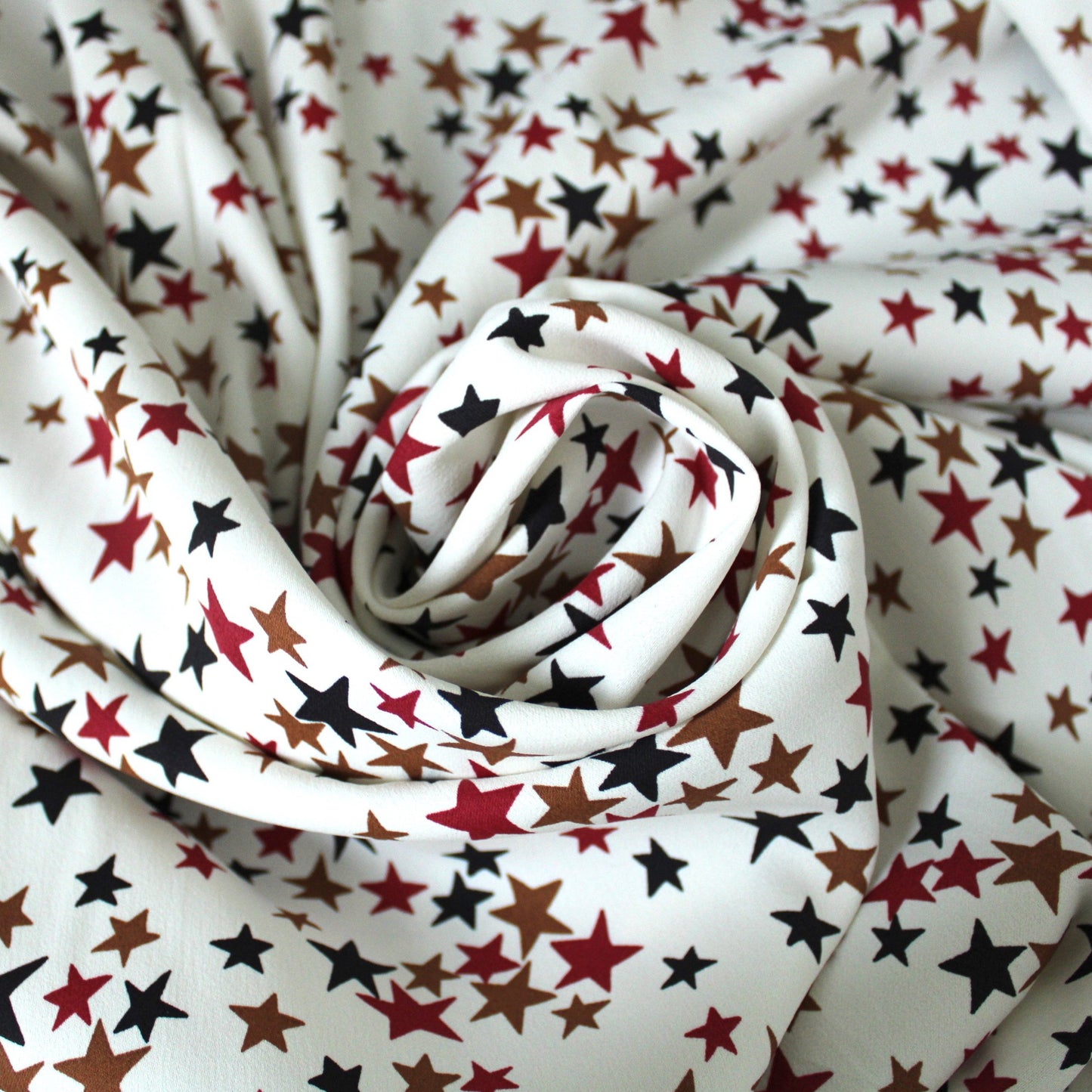 Tissu crêpe viscose stretch - imprimé étoiles - photo 1/5 | So Tissus