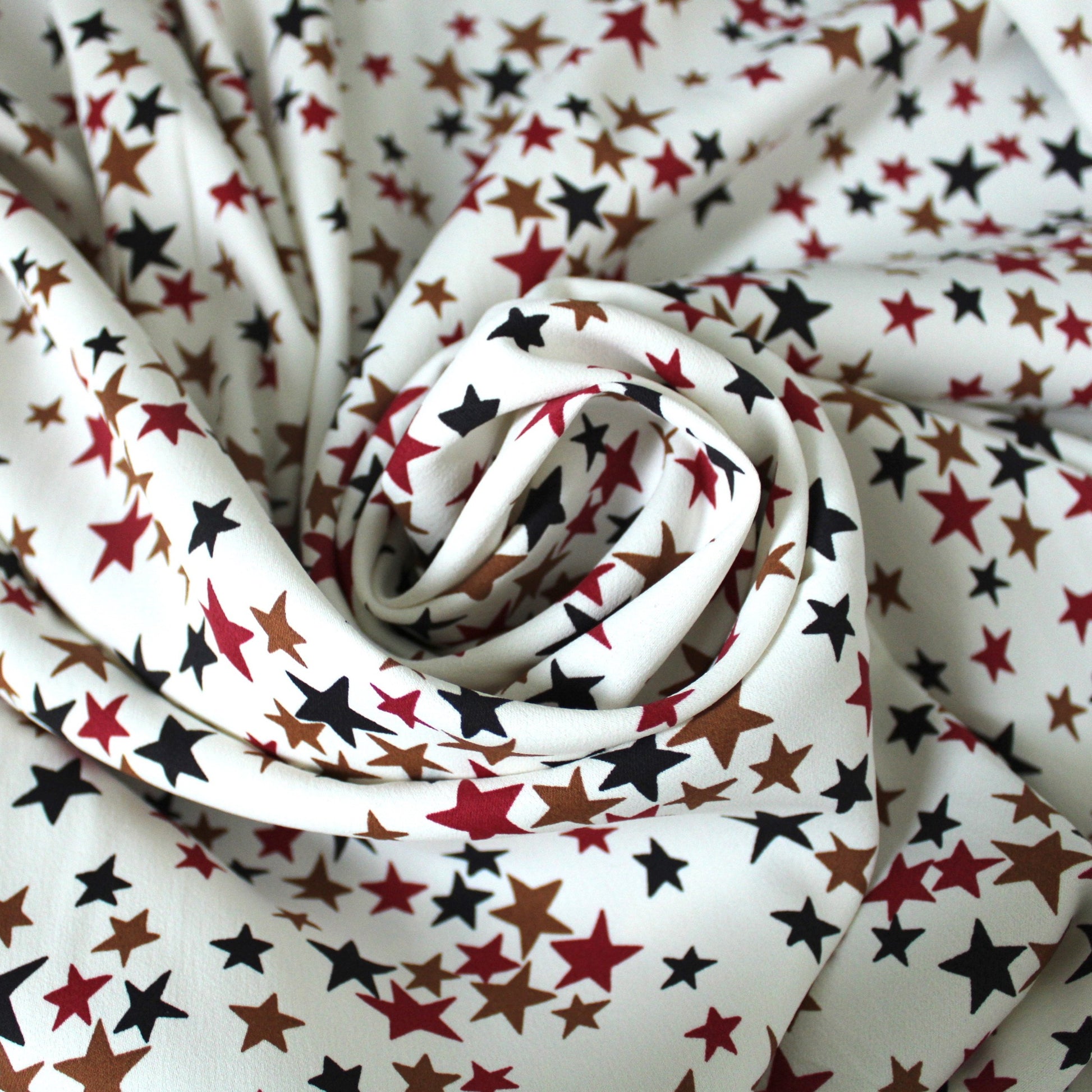 Tissu crêpe viscose stretch - imprimé étoiles - photo 1/5 | So Tissus