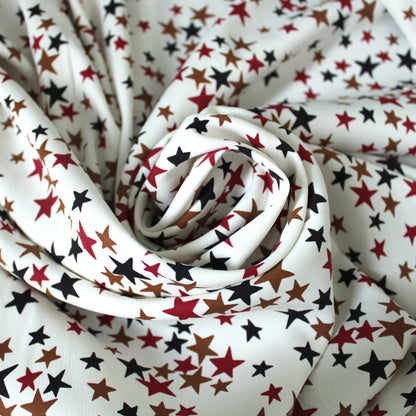 Tissu crêpe viscose stretch - imprimé étoiles - photo 1/5 | So Tissus
