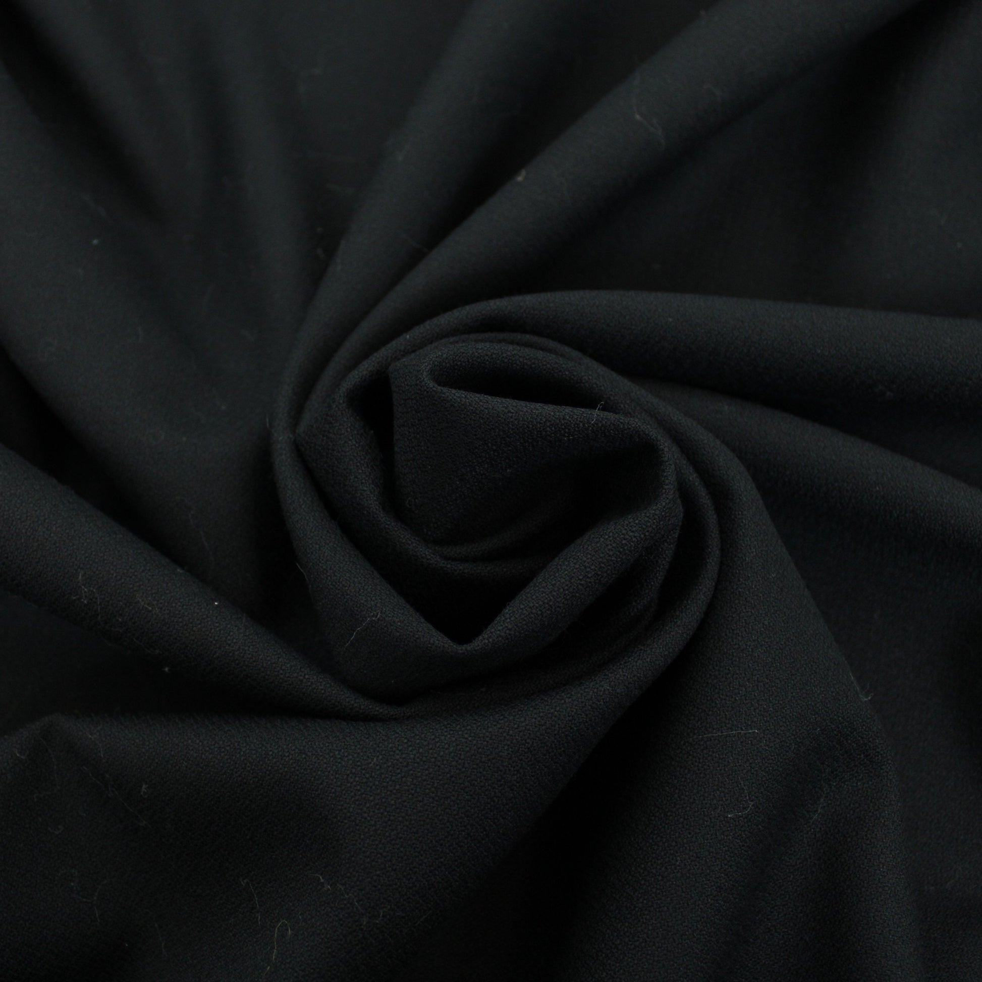 Tissu crêpe de laine - noir - photo 1/4 | So Tissus