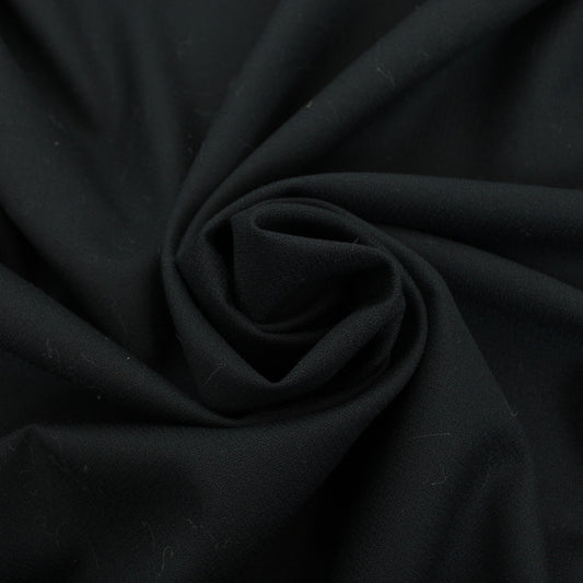 Tissu crêpe de laine - noir - photo 1/4 | So Tissus