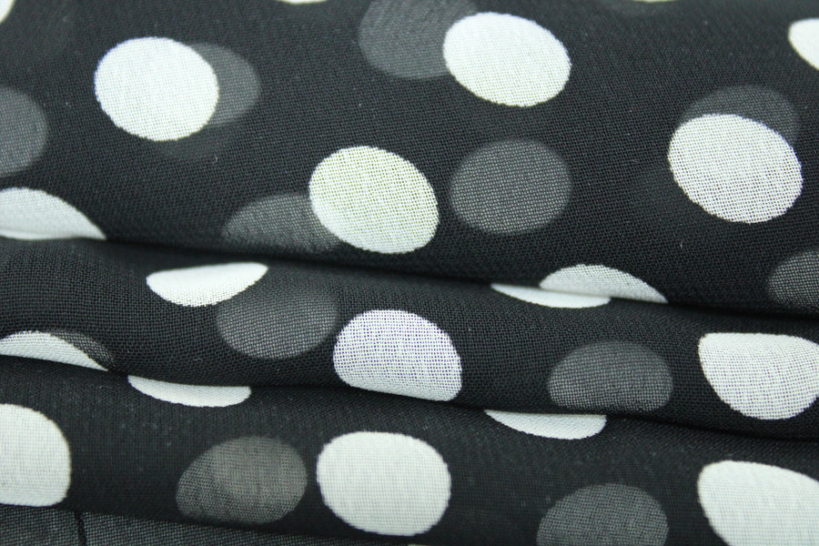 Tissu crêpe georgette  - noir à pois blanc