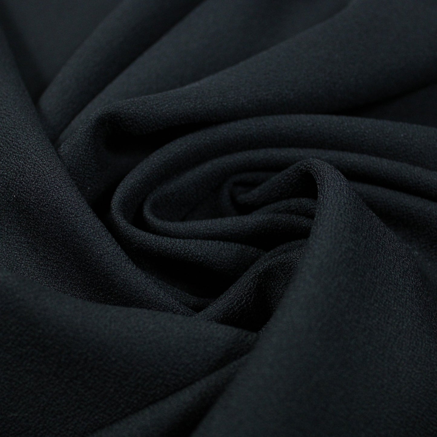 Tissu crêpe texturé - noir - photo 1/3 | So Tissus