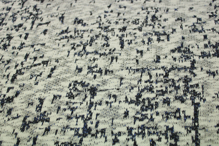 Tissu maille tacheté - blanc, gris et bleu