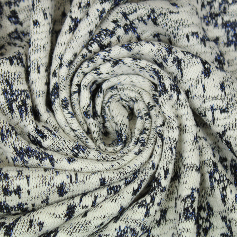 Tissu maille tacheté - blanc, gris et bleu