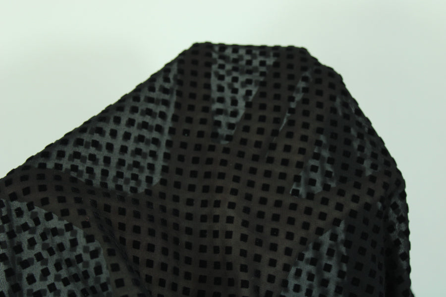 Tissu dévoré - motif géométrique - noir