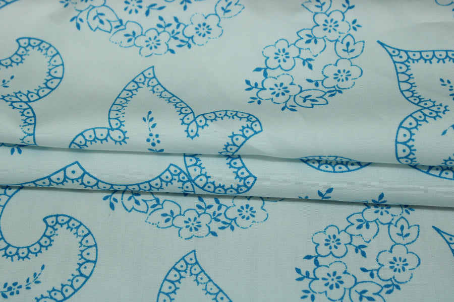 Tissu popeline coton - imprimé arabesque - blanc et bleu